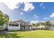 Spacious backyard with large home and patio at 4801 Beach Blvd, Orlando, FL 32803