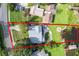 Aerial view of house and property, showcasing expansive backyard and landscaping at 4801 Beach Blvd, Orlando, FL 32803