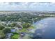 Aerial view of community near a lake and city skyline at 4801 Beach Blvd, Orlando, FL 32803