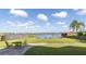 Lakefront backyard with patio furniture at 4801 Beach Blvd, Orlando, FL 32803