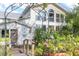 Inviting entryway with stone pathway and lush landscaping at 4801 Beach Blvd, Orlando, FL 32803