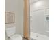Clean bathroom with toilet, shower, and linen curtain at 684 Preston Cove Dr, St Cloud, FL 34771