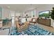 Open concept living space with a large sectional sofa and kitchen views at 684 Preston Cove Dr, St Cloud, FL 34771