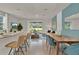 Open concept kitchen and living area with island and stainless steel appliances at 684 Preston Cove Dr, St Cloud, FL 34771