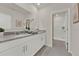 Bathroom with double vanity, granite countertop and shower at 684 Preston Cove Dr, St Cloud, FL 34771