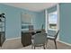 Bright office with a desk and two chairs at 684 Preston Cove Dr, St Cloud, FL 34771