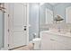 Modern bathroom with white vanity, tile backsplash and decorative accents at 1010 N Pennsylvania Ave, Winter Park, FL 32789