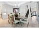 Open concept dining area with modern light fixtures and stylish furnishings at 1010 N Pennsylvania Ave, Winter Park, FL 32789