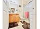 Clean bathroom with shower/tub combo and wood vanity at 14650 Sweet Acacia Dr, Orlando, FL 32828