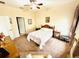 Bedroom with double bed, ceiling fan and access to bathroom at 14650 Sweet Acacia Dr, Orlando, FL 32828