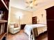 Bright bedroom with a double bed and ceiling fan at 14650 Sweet Acacia Dr, Orlando, FL 32828