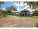 House with covered entry and long driveway at 17017 Marsh Rd, Winter Garden, FL 34787