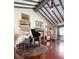Elegant living room with grand piano and hardwood floors at 17017 Marsh Rd, Winter Garden, FL 34787