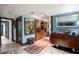 Elegant hallway with hardwood floors and unique artwork at 17017 Marsh Rd, Winter Garden, FL 34787
