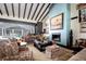Living room with pool view, fireplace and high ceilings at 17017 Marsh Rd, Winter Garden, FL 34787