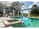 Inviting pool and spa with screened enclosure at 17017 Marsh Rd, Winter Garden, FL 34787