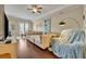 Comfortable living room with large sectional sofa and hardwood floors at 501 Mirasol Cir # 213, Celebration, FL 34747