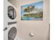 Stackable washer and dryer in unit, modern and updated at 501 Mirasol Cir # 213, Celebration, FL 34747