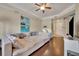 Spacious living area with sectional sofa and hardwood floors at 501 Mirasol Cir # 213, Celebration, FL 34747