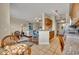 Open concept kitchen with granite counters and breakfast bar at 501 Mirasol Cir # 213, Celebration, FL 34747