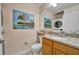 Clean bathroom, granite countertop, washer and dryer in unit at 501 Mirasol Cir # 213, Celebration, FL 34747