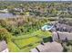 Aerial view of community with pool and lake at 623 Dory Ln # 308, Altamonte Springs, FL 32714