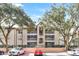 Condo building with balconies and plenty of parking at 623 Dory Ln # 308, Altamonte Springs, FL 32714