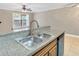 Double stainless steel sink with modern faucet in kitchen at 623 Dory Ln # 308, Altamonte Springs, FL 32714