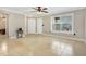 Bright living room featuring tile floors and a ceiling fan at 623 Dory Ln # 308, Altamonte Springs, FL 32714