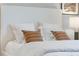 Main bedroom with plush bedding and pillows at 692 Preston Cove Dr, St Cloud, FL 34771