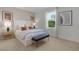 Bright bedroom with plush carpeting and large window at 692 Preston Cove Dr, St Cloud, FL 34771