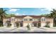 Modern townhouses with attached garages and green landscaping at 692 Preston Cove Dr, St Cloud, FL 34771