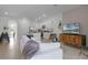 Open concept living room with kitchen and dining area views at 692 Preston Cove Dr, St Cloud, FL 34771