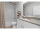 Clean bathroom with granite vanity and shower/tub combo at 692 Preston Cove Dr, St Cloud, FL 34771