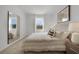 Spacious Primary bedroom with large mirror and natural light at 692 Preston Cove Dr, St Cloud, FL 34771