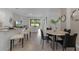 Open concept dining area with marble top table and seating for four at 692 Preston Cove Dr, St Cloud, FL 34771