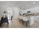 Modern kitchen with stainless steel appliances and island at 692 Preston Cove Dr, St Cloud, FL 34771