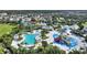 Aerial view of community pool and water park with multiple slides at 7647 Fairfax Dr, Kissimmee, FL 34747