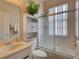 Clean bathroom with a shower/tub combo and a vanity at 1102 Golf Course Pkwy, Davenport, FL 33837