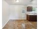 Simple dining area with tile floors and access to the kitchen at 119 Summer View Cir, Winter Haven, FL 33880