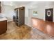 Kitchen with stainless steel appliances and view to living room at 119 Summer View Cir, Winter Haven, FL 33880