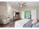 Main bedroom with king-size bed, dresser, and access to bathroom and other rooms at 1820 Blaine Ter, Winter Park, FL 32792