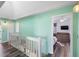 Upstairs hall with skylight and view of bedroom at 1820 Blaine Ter, Winter Park, FL 32792