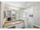 Updated bathroom with granite vanity, white subway tile shower, and frameless glass enclosure at 1820 Blaine Ter, Winter Park, FL 32792