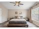 Main bedroom with a large bed, nightstands, and wood flooring at 1820 Blaine Ter, Winter Park, FL 32792
