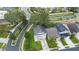 Aerial view of a charming house with a gray roof and a neatly landscaped yard at 1820 Blaine Ter, Winter Park, FL 32792