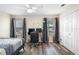 Bedroom with a bed, desk, and double window with gray curtains at 1820 Blaine Ter, Winter Park, FL 32792