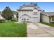 Two-story house with gray siding and attached garage at 1820 Blaine Ter, Winter Park, FL 32792