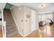 Carpeted stairs with white railing leading to the upper level at 1820 Blaine Ter, Winter Park, FL 32792