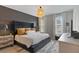 Spacious main bedroom with king-size bed and stylish decor at 2321 Lobelia Dr, Lake Mary, FL 32746